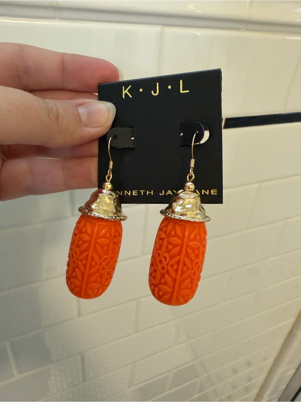 Kenneth Jay Lane Orange Carved Drop Earrings with Gold Caps